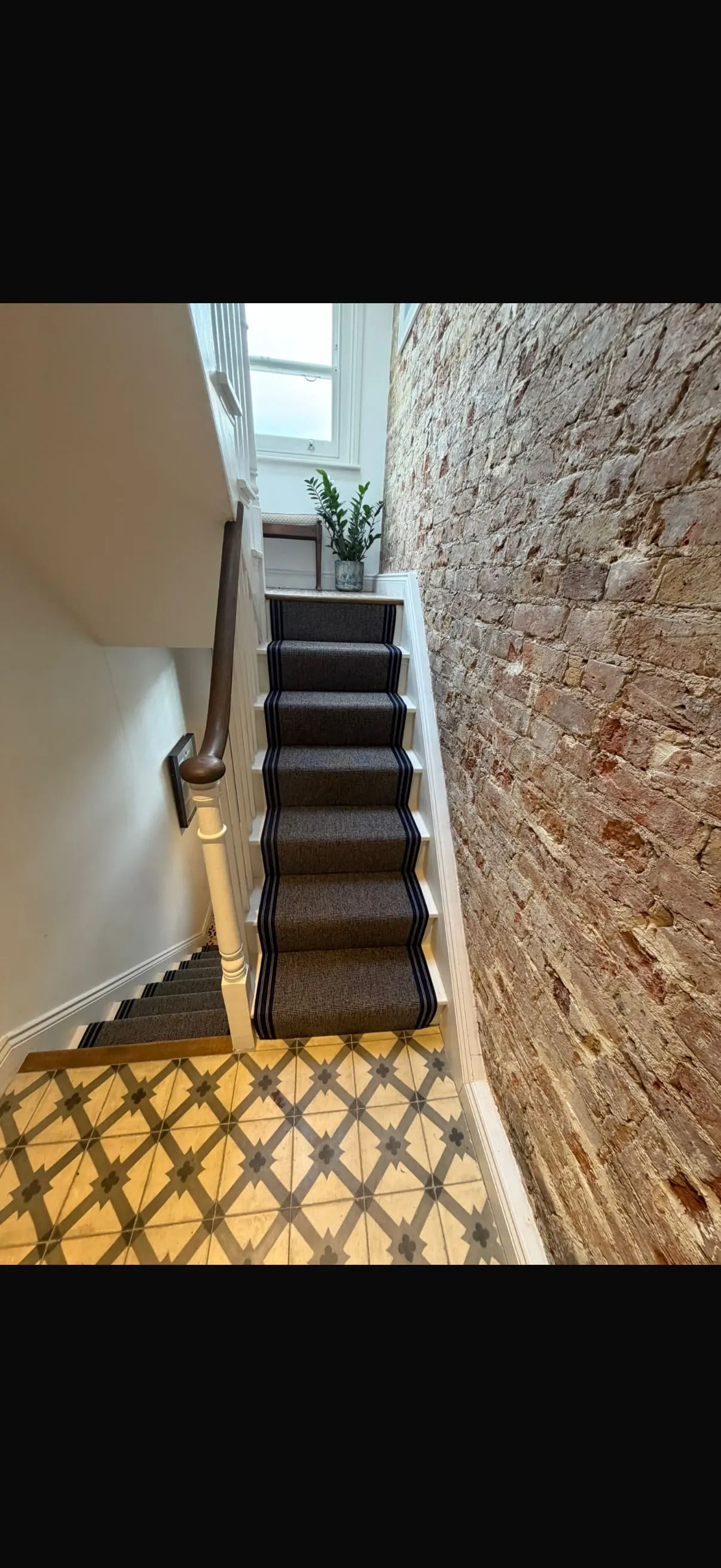 Finished stair runner installation
